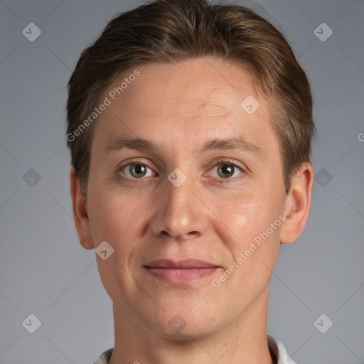 Joyful white adult male with short  brown hair and grey eyes