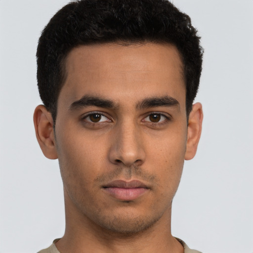 Neutral latino young-adult male with short  brown hair and brown eyes