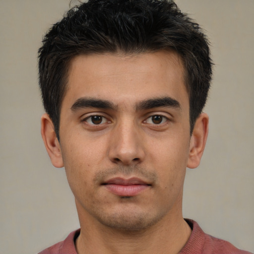 Neutral white young-adult male with short  brown hair and brown eyes