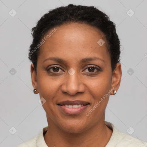 Joyful latino young-adult female with short  black hair and brown eyes