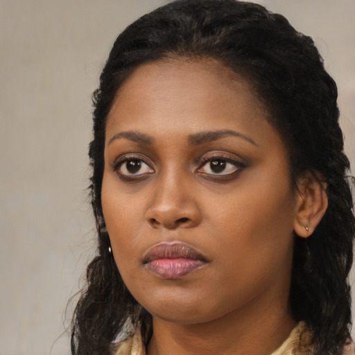 Neutral black young-adult female with long  black hair and brown eyes