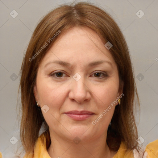 Joyful white adult female with medium  brown hair and brown eyes