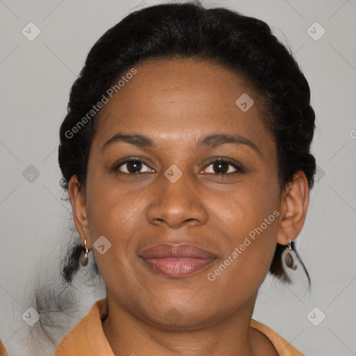 Joyful latino adult female with short  brown hair and brown eyes