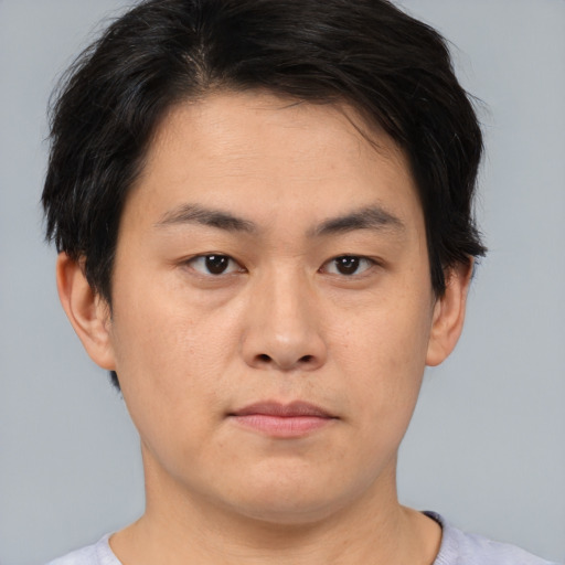 Neutral asian young-adult male with short  brown hair and brown eyes
