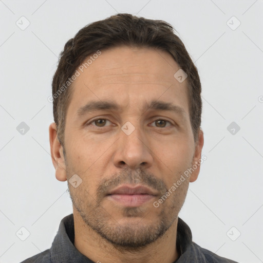 Neutral white adult male with short  brown hair and brown eyes