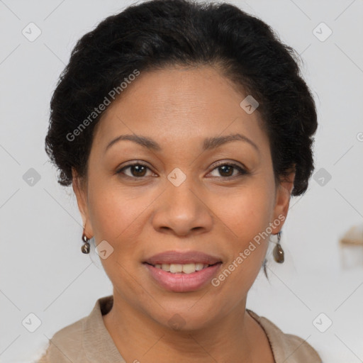 Joyful latino adult female with short  brown hair and brown eyes