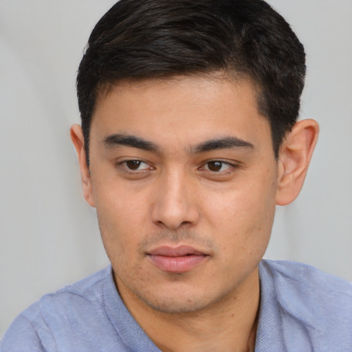 Neutral white young-adult male with short  black hair and brown eyes