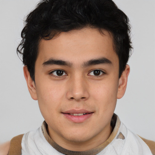 Joyful latino young-adult male with short  brown hair and brown eyes