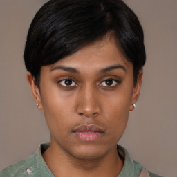 Neutral asian young-adult female with short  brown hair and brown eyes