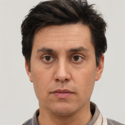 Neutral white adult male with short  brown hair and brown eyes