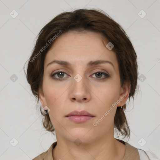 Neutral white young-adult female with medium  brown hair and grey eyes