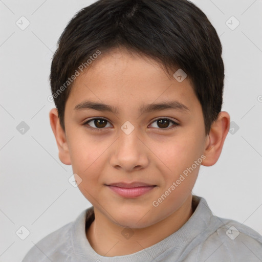 Joyful white child male with short  brown hair and brown eyes