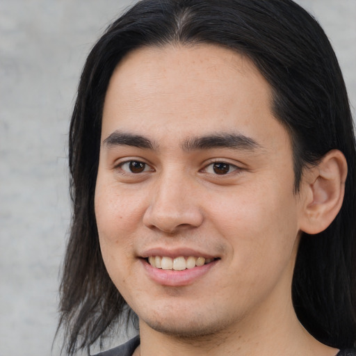 Joyful white young-adult male with medium  brown hair and brown eyes
