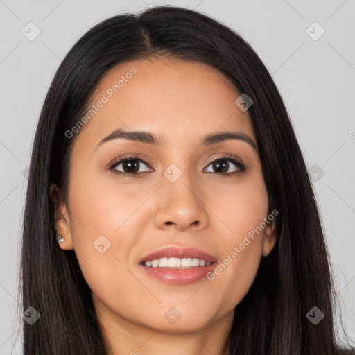 Joyful latino young-adult female with long  brown hair and brown eyes