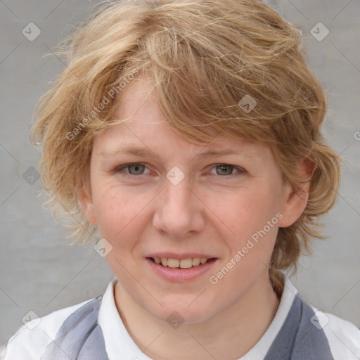 Joyful white young-adult female with medium  brown hair and blue eyes