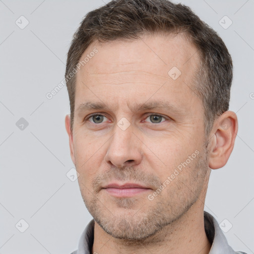 Neutral white adult male with short  brown hair and brown eyes