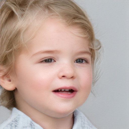 Joyful white child female with medium  blond hair and blue eyes