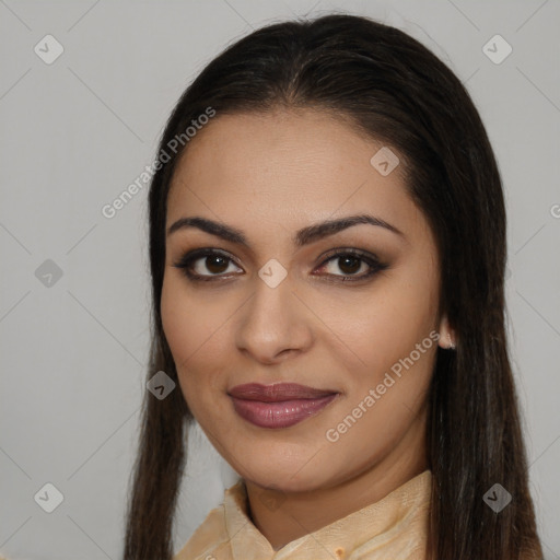 Joyful latino young-adult female with long  brown hair and brown eyes