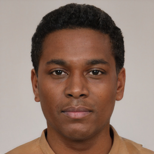 Neutral black young-adult male with short  black hair and brown eyes