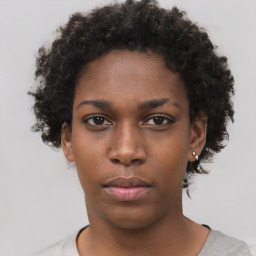 Neutral black young-adult female with short  black hair and brown eyes