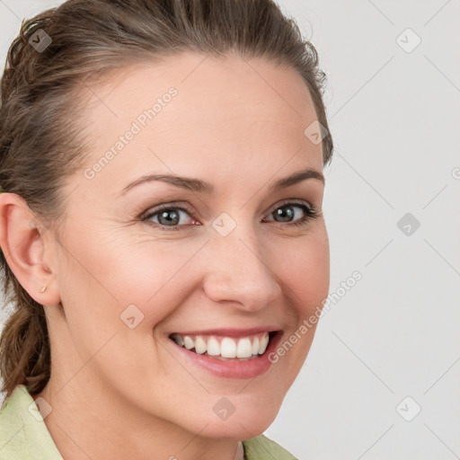 Joyful white young-adult female with medium  brown hair and blue eyes