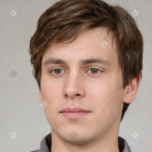 Neutral white young-adult male with short  brown hair and grey eyes