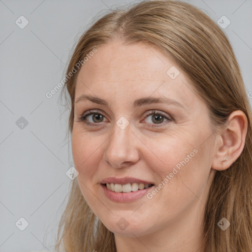 Joyful white adult female with long  brown hair and brown eyes