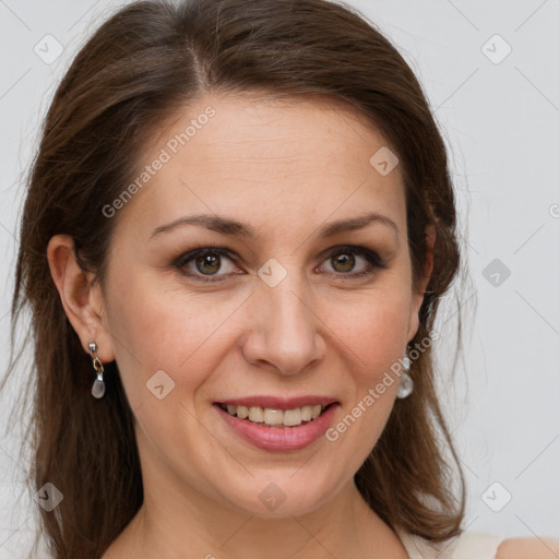 Joyful white adult female with long  brown hair and brown eyes