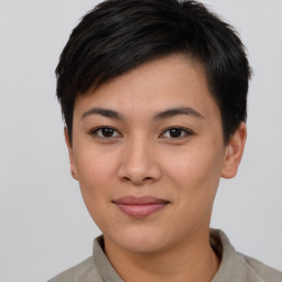 Joyful asian young-adult female with short  brown hair and brown eyes