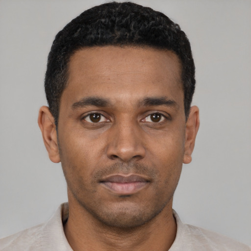 Neutral black young-adult male with short  black hair and brown eyes