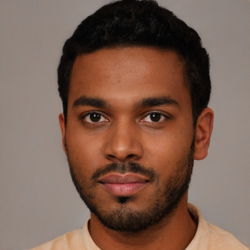 Neutral black young-adult male with short  black hair and brown eyes