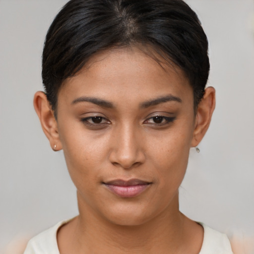 Joyful asian young-adult female with short  brown hair and brown eyes