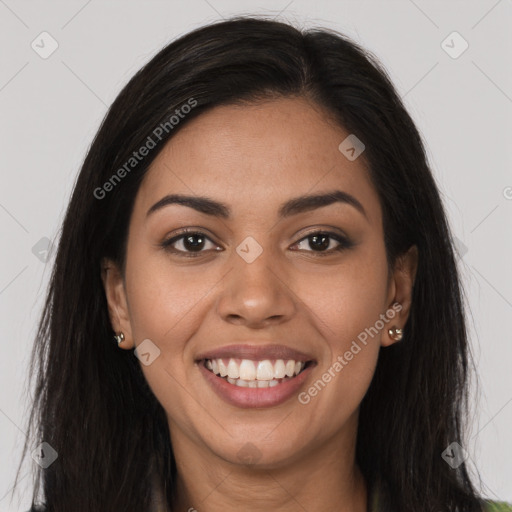 Joyful latino young-adult female with long  brown hair and brown eyes