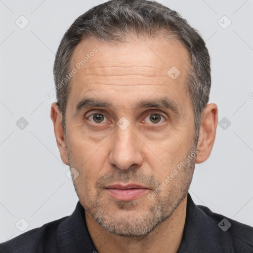 Neutral white adult male with short  brown hair and brown eyes