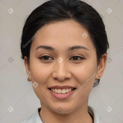 Joyful asian young-adult female with medium  brown hair and brown eyes