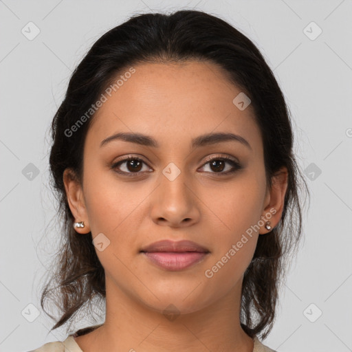 Joyful latino young-adult female with medium  brown hair and brown eyes