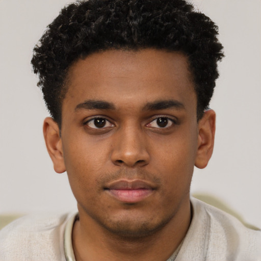 Neutral black young-adult male with short  brown hair and brown eyes