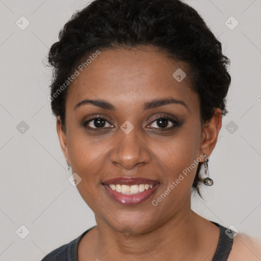 Joyful black young-adult female with short  brown hair and brown eyes