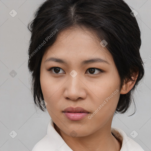 Neutral asian young-adult female with medium  brown hair and brown eyes