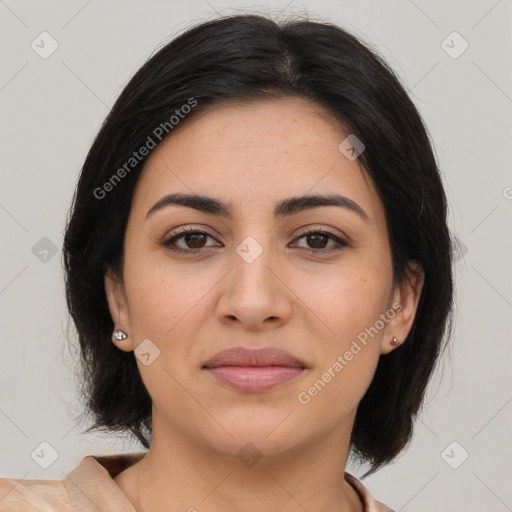 Joyful latino young-adult female with medium  brown hair and brown eyes