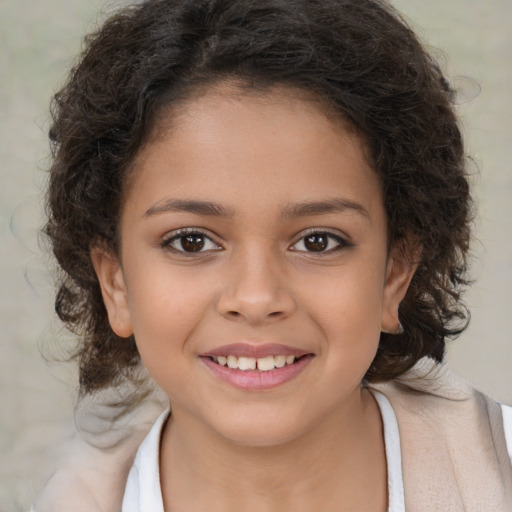 Joyful white child female with medium  brown hair and brown eyes