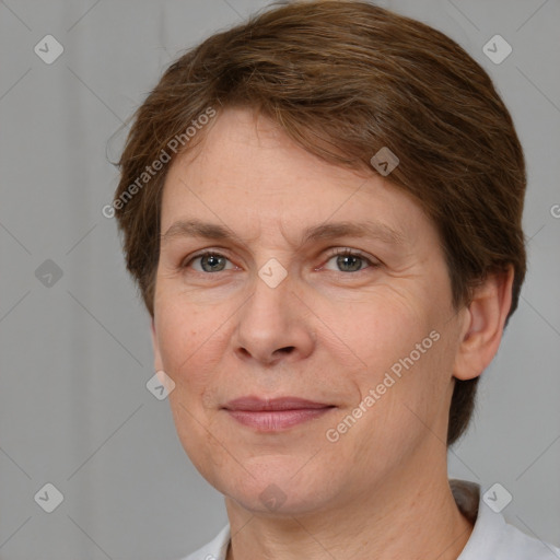 Joyful white adult female with short  brown hair and brown eyes