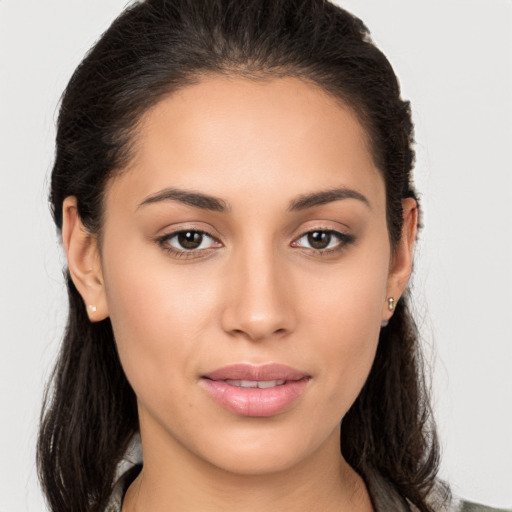 Joyful white young-adult female with long  brown hair and brown eyes