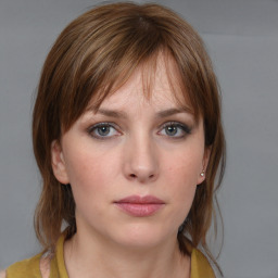 Neutral white young-adult female with medium  brown hair and grey eyes