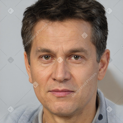 Neutral white adult male with short  brown hair and brown eyes