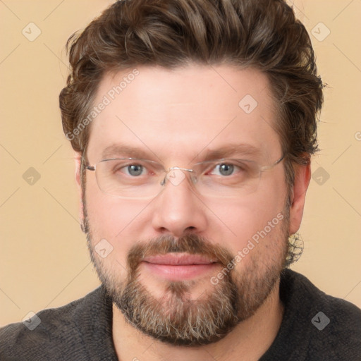 Joyful white adult male with short  brown hair and grey eyes