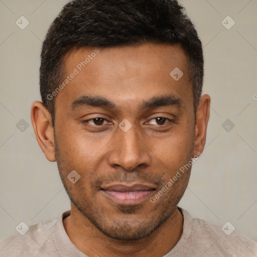 Joyful latino young-adult male with short  brown hair and brown eyes