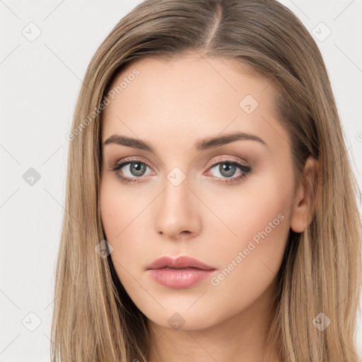 Neutral white young-adult female with long  brown hair and brown eyes