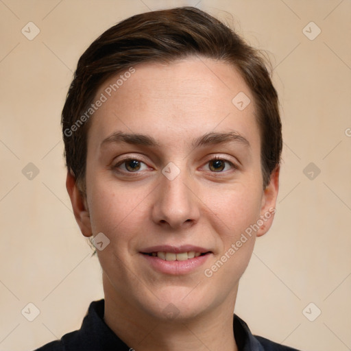 Joyful white young-adult female with short  brown hair and grey eyes