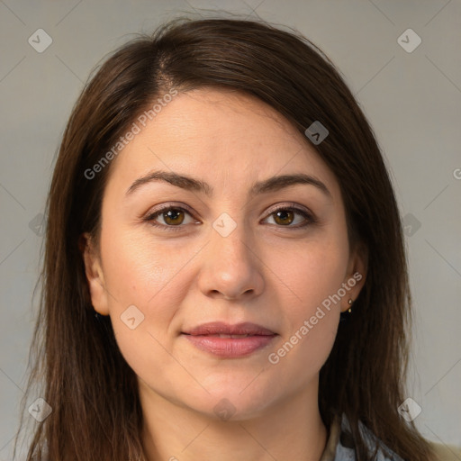 Joyful white young-adult female with long  brown hair and brown eyes